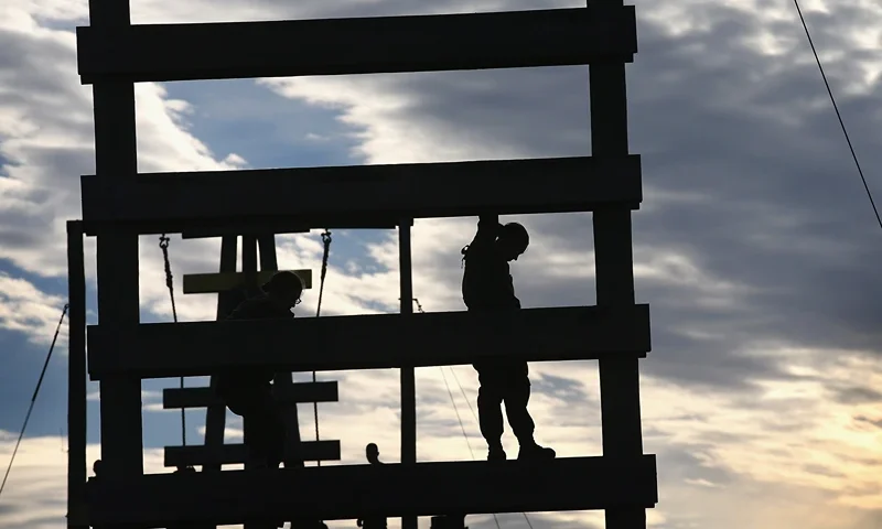CAMP LEJEUNE, NC - FEBRUARY 20: A female Marine climbs the Stairway to Heaven obstacle on the Confidence Course during Marine Combat Training (MCT) on February 20, 2013 at Camp Lejeune, North Carolina. Since 1988 all non-infantry enlisted male Marines have been required to complete 29 days of basic combat skills training at MCT after graduating from boot camp. MCT has been required for all enlisted female Marines since 1997. About six percent of enlisted Marines are female. (Photo by Scott Olson/Getty Images)