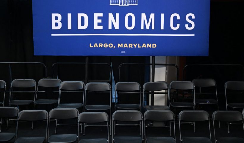 Empty chairs are pictured under a "Bidenomics" sign after US President Joe Biden delivered remarks on his economic agenda at Prince George's Community College in Largo, Maryland, on September 14, 2023. (Photo by Jim WATSON / AFP) (Photo by JIM WATSON/AFP via Getty Images)