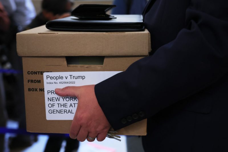 NEW YORK, NEW YORK - OCTOBER 02: A box is carried as the civil fraud trial of former President Donald Trump is set to begin at New York State Supreme Court on October 02, 2023 in New York City. Former President Trump may be forced to sell off his properties after Justice Arthur Engoron canceled his business certificates after ruling that he committed fraud for years while building his real estate empire after being sued by Attorney General Letitia James, who is seeking $250 million in damages. The trial will determine how much he and his companies will be penalized for the fraud. (Photo by Michael M. Santiago/Getty Images)