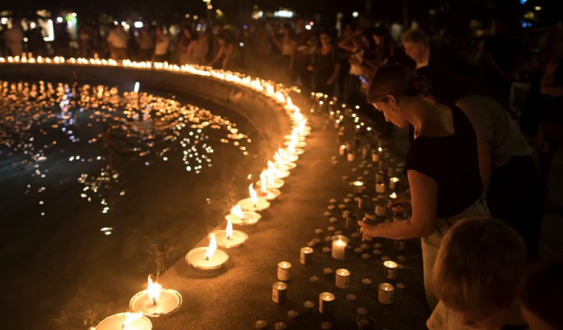 TEL AVIV, ISRAEL - OCTOBER 12: People light candles in memory of the civilians and soldiers killed, and for the hostages that were taken to the Gaza Strip, in Dizingof Square on October 12, 2023 in Tel Aviv, Israel. Israel has sealed off Gaza and conducted airstrikes on Palestinian territory after an attack by Hamas killed hundreds and took more than 100 hostages. On October 7, the Palestinian militant group Hamas launched a surprise attack on Israel from Gaza by land, sea, and air, killing over 1300 people and wounding more than 2000. Israeli soldiers and civilians have also been taken hostage by Hamas and moved into Gaza. The attack prompted a declaration of war by Israeli Prime Minister Benjamin Netanyahu. (Photo by Amir Levy/Getty Images)