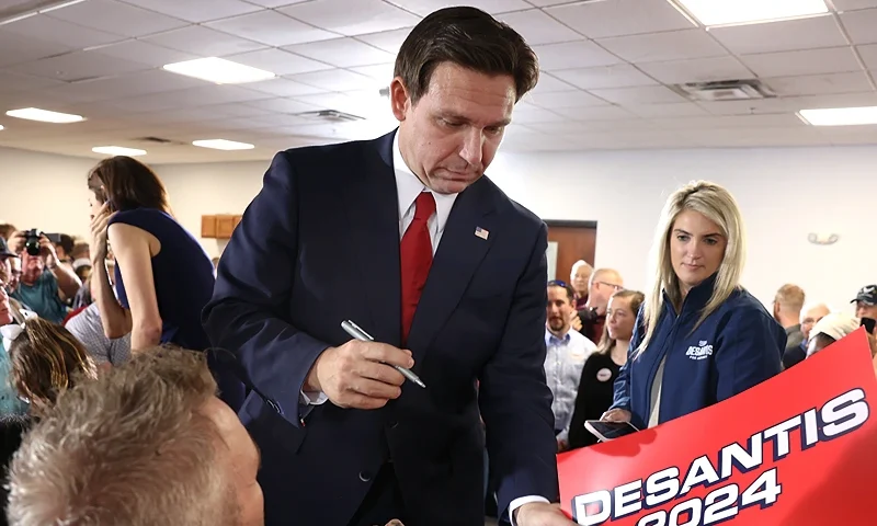 CEDAR RAPIDS, IOWA - OCTOBER 08: Republican presidential candidate Florida Governor Ron DeSantis greets guests during a campaign event at Refuge City Church on October 08, 2023 in Cedar Rapids, Iowa. DeSantis said Israel can and should defend themselves against the "Hamas terrorists" during the event and said that he, unlike his adversary Republican presidential candidate former President Donald Trump, has a plan to make Mexico pay for building a border wall. (Photo by Scott Olson/Getty Images)
