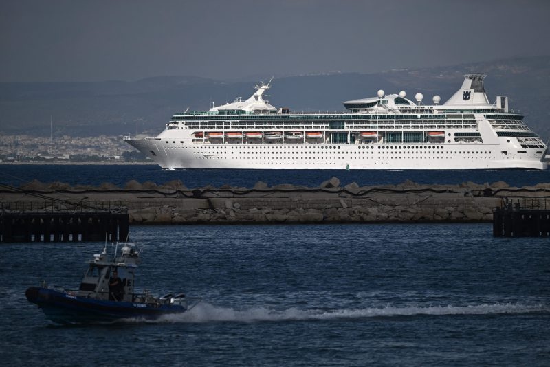 The 'Rhapsody of the Seas' cruise liner carrying US citizens leaves the Israeli port of Haifa to be evacuated to the Mediterranean island of Cyprus on October 16, 2023, amid the ongoing battles between Israel and the Palestinian Islamist group Hamas. Thousands of people, both Israeli and Palestinians have died since October 7, 2023, after Palestinian Hamas militants based in the Gaza Strip, entered southern Israel in a surprise attack leading Israel to declare war on Hamas in Gaza on October 8. (Photo by Aris MESSINIS / AFP) (Photo by ARIS MESSINIS/AFP via Getty Images)