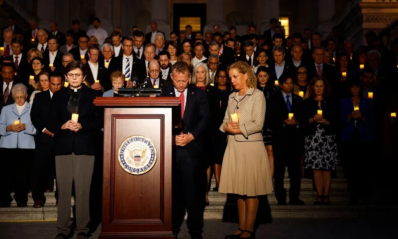 Members of Congress are led in prayer by Margaret Grun Kibben, the chaplain of the U.S. House of Representatives, during a vigil for Israel on the steps of the U.S. Capitol Building on October 12, 2023 in Washington, DC. House Democrats and Republicans gathered for a moment of silence to honor the victims of last eekends attacks by Palestinian militants that has left hundreds of civilians dead and over a hundred hostages taken into Gaza. (Photo by Anna Moneymaker/Getty Images)