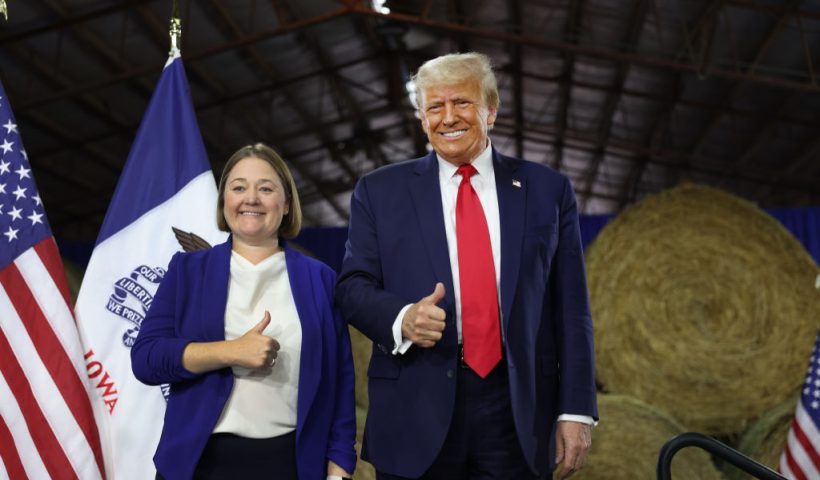 ADEL, IOWA - OCTOBER 16: Republican presidential candidate former President Donald Trump poses with Iowa Attorney General Brenna Bird after receiving her endorsement during a campaign event at the Dallas County Fairgrounds on October 16, 2023 in Adel, Iowa. Trump is also scheduled to speak at a rally in nearby Clive later in the afternoon. (Photo by Scott Olson/Getty Images)