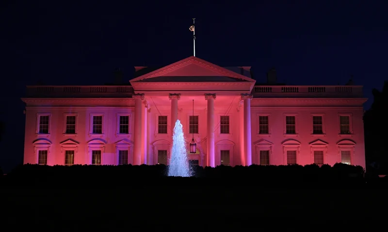 WASHINGTON, DC - OCTOBER 19: The White House is illuminated in pink on October 19, 2023 in Washington, DC. The Biden Administration lit the White House in pink to mark the Breast Cancer Awareness Month and National Mammography Day on October 20. (Photo by Alex Wong/Getty Images)