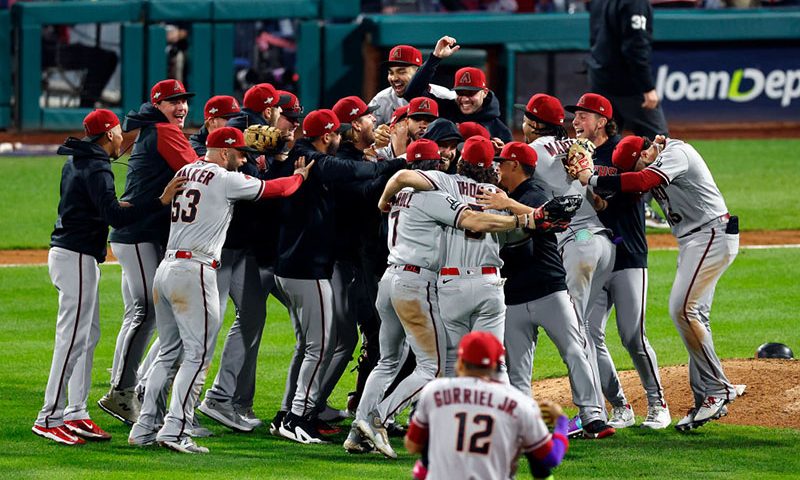 The Arizona Diamondbacks celebrate after beating the Philadelphia Phillies 4-2 in Game Seven of the Championship Series at Citizens Bank Park on October 24, 2023 in Philadelphia, Pennsylvania. (Photo by Rich Schultz/Getty Images)