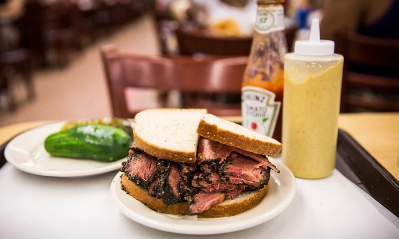 NEW YORK, NY - AUGUST 29: In this photo illustration, a pastrami on rye sandwich is displayed in Katz's Deli on August 29, 2014 in New York City. The iconic New York deli recently sold the air rights to above their building, potentially allowing developers to build on top of it. (Photo by Andrew Burton/Getty Images)