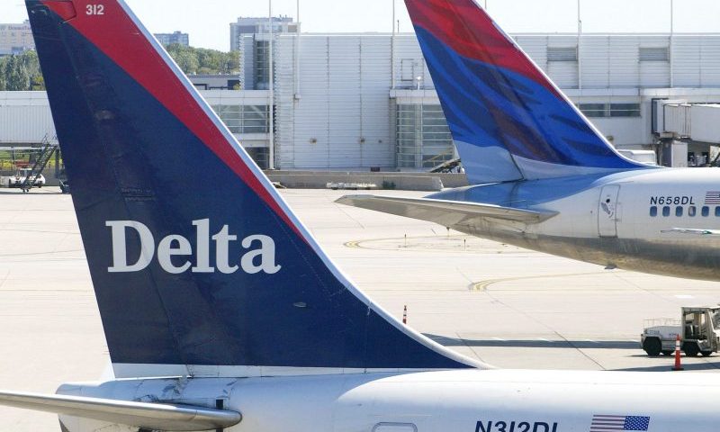 CHICAGO - SEPTEMBER 17: Tails of two Delta Air Lines jets are visible at their gates September 17, 2004 at O'Hare International Airport in Chicago, Illinois. Delta Air Lines may be the next U.S. airline to seek bankruptcy protection. (Photo by Tim Boyle/Getty Images)
