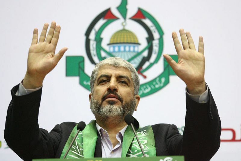 Exiled Hamas leader Khaled Meshaal addresses a rally in Damascus on January 22, 2010 to commemorate the first anniversary of the Islamic movement's "triumph" during Israel's devastating offensive in Gaza which ended just over a year ago. AFP PHOTO/LOUAI BESHARA (Photo credit should read LOUAI BESHARA/AFP via Getty Images)