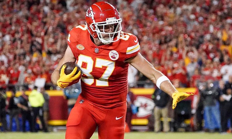 Kansas City Chiefs tight end Travis Kelce (87) runs the ball against the Denver Broncos during the first half at GEHA Field at Arrowhead Stadium. Mandatory Credit: Denny Medley-USA TODAY Sports/File Photo