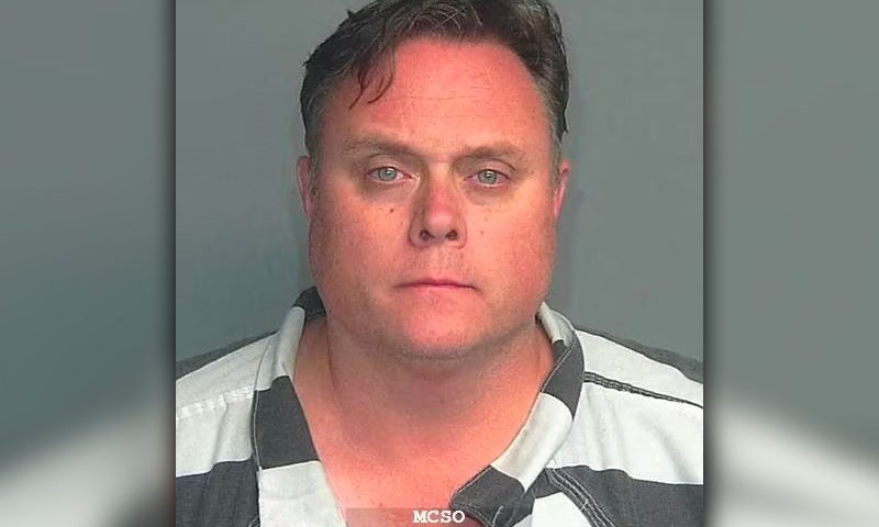 David Scott, head of Exxon Mobil?s shale oil and gas business, is seen in a police mug shot obtained by Reuters on October 8, 2023. Montgomery County Sheriff's Office/Handout via REUTERS