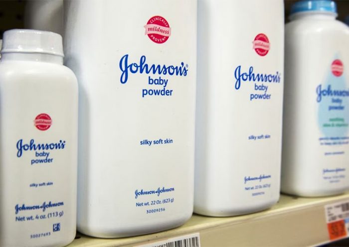 Bottles of Johnson & Johnson baby powder line a drugstore shelf in New York October 15, 2015. REUTERS/Lucas Jackson/File Photo