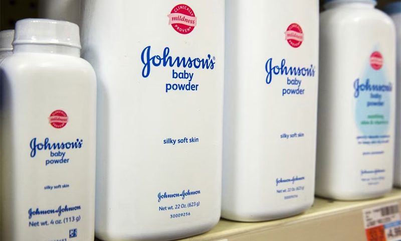 Bottles of Johnson & Johnson baby powder line a drugstore shelf in New York October 15, 2015. REUTERS/Lucas Jackson/File Photo
