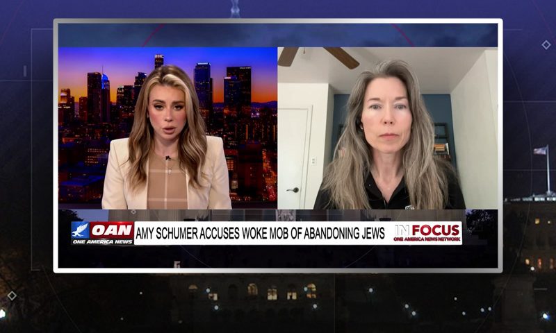 Video still from In Focus on One America News Network showing a split screen of the host on the left side, and on the right side is the guest, Amy Peikoff.