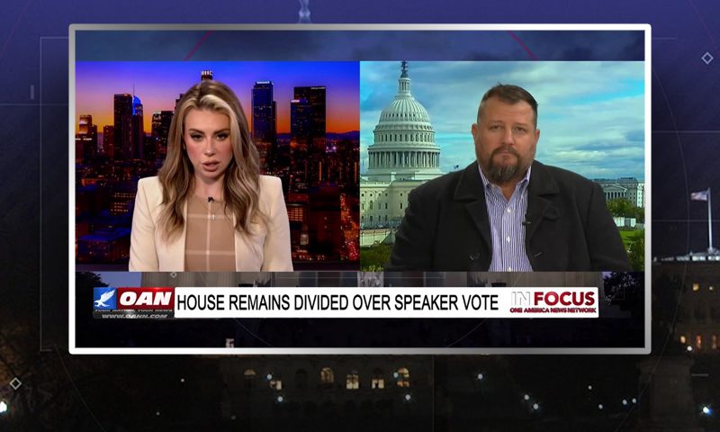 Video still from In Focus on One America News Network showing a split screen of the host on the left side, and on the right side is the guest, Noel Fritsch.