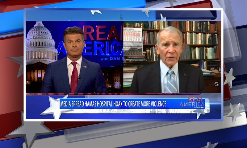 Video still from Real America on One America News Network showing a split screen of the host on the left side, and on the right side is the guest, Oliver North.