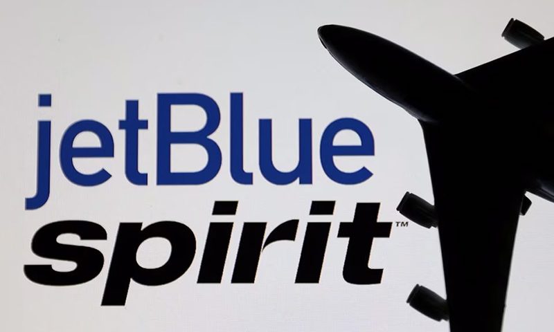 Airplane model is placed on displayed Spirit Airlines and jetBlue Airways logos in this illustration taken, June 21, 2022. REUTERS/Dado Ruvic/Illustrations/File Photo