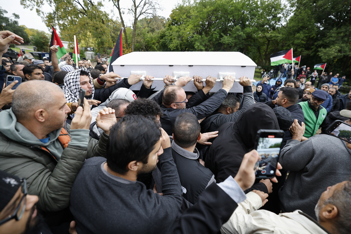 LAGRANGE, ILLINOIS - OCTOBER 16: Mourners carry the coffin of six-year-old Wadea Al-Fayoume during his funeral at Parkholm Cemetery on October 16, 2023 in LaGrange, Illinois. Wadea was stabbed to death and his mother seriously injured in an attack by the family's landlord, Joseph Czuba, motivated by hatred for Muslims and the fighting in Israel and Gaza, according to published reports citing police. (Photo by Kamil Krzaczynski/Getty Images)