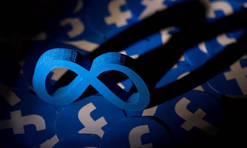 Meta and Facebook logos are seen in this illustration taken February 15, 2022. REUTERS/Dado Ruvic/Illustration/File Photo