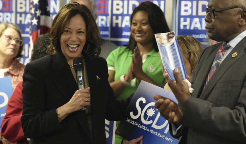 Vice President Kamala Harris, left, laughs as she stands with Rep. Jim Clyburn, D-S.C., for the official filing of President Joe Biden's paperwork to appear on South Carolina's 2024 Democratic presidential primary, on Friday, Nov. 10, 2023, in Columbia, S.C. (AP Photo/Meg Kinnard)