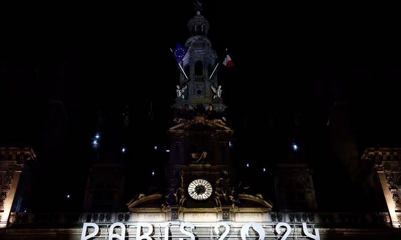 Christmas village in the colours of the Olympic and Paralympic Games in Paris - Paris City Hall, Paris, France - November 28, 2023 General view of a Paris 2024 sign in the village REUTERS/Christian Hartmann/ File photo