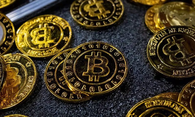 Bitcoin coins are seen at a stand during the Bitcoin Conference 2023, in Miami Beach, Florida, U.S., May 19, 2023. REUTERS/Marco Bello/File Photo