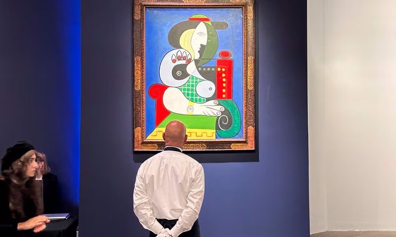 Pablo Picasso's 1932 painting "Femme a la Montre" is displayed at an auction at Sotheby's, in New York City, U.S., November 8, 2023. REUTERS/Ben Kellerman