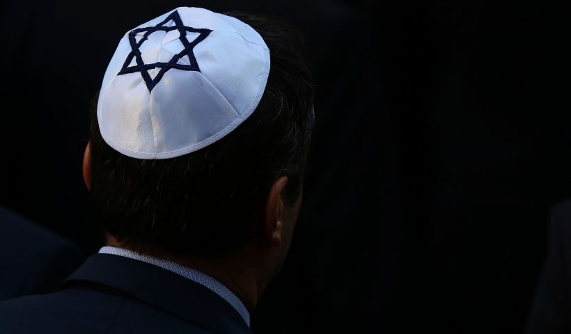 A man wearing a kippah Jewish skullcap arrives at the synagogue in Halle, eastern Germany, on October 10, 2019, one day after the attack where two people were shot dead. - German leaders visited the scene of the deadly anti-Semitic gun attack carried out on the holy day of Yom Kippur, as Jews demanded action to protect the community from the rising threat of neo-Nazi violence. (Photo by Ronny Hartmann / AFP) (Photo by RONNY HARTMANN/AFP via Getty Images)