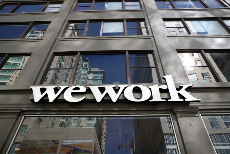 SAN FRANCISCO, CALIFORNIA - OCTOBER 07: A sign is posted on the exterior of a WeWork office on October 07, 2019 in San Francisco, California. Days after withdrawing its registration for an initial public offering, WeWork also warned employees that the company could be set to lay off nearly 2,000 people, about 16 percent of its workforce. (Photo by Justin Sullivan/Getty Images)