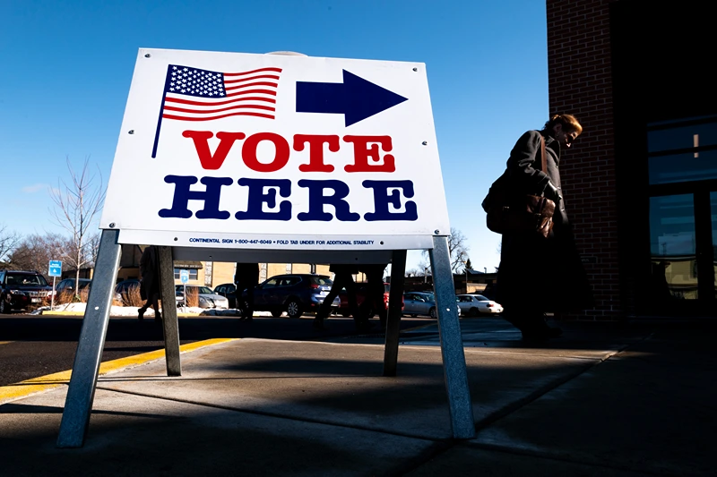 Voters In 14 States Head To The Polls On Super Tuesday.
  MINNEAPOLIS, MN - MARCH 03: A voter arrives at a polling place on March 3, 2020 in Minneapolis, Minnesota. 1,357 Democratic delegates are at stake as voters cast their ballots in 14 states and American Samoa on what is known as Super Tuesday. (Photo by Stephen Maturen/Getty Images)