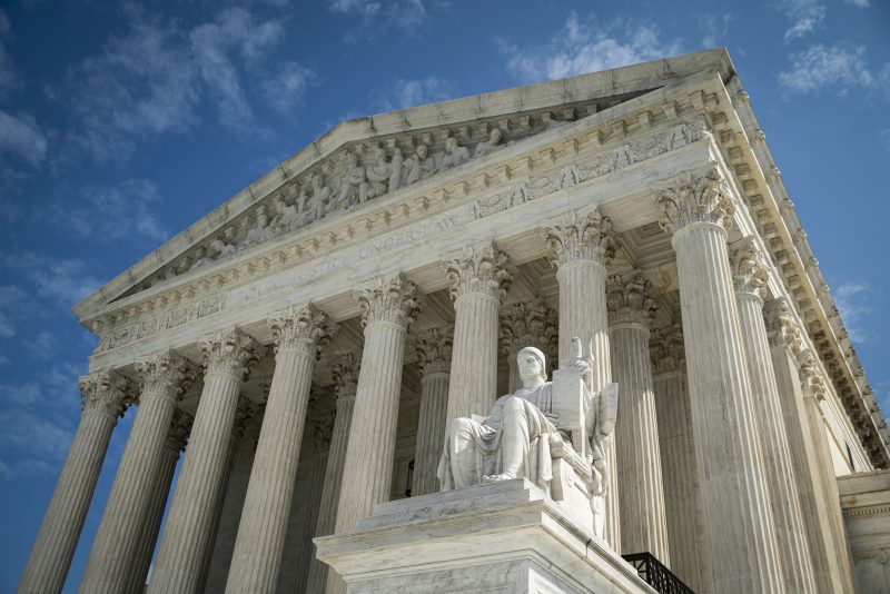 WASHINGTON, DC - SEPTEMBER 28: The Guardian or Authority of Law, created by sculptor James Earle Fraser, rests on the side of the U.S. Supreme Court on September 28, 2020 in Washington, DC. This week Seventh U.S. Circuit Court Judge Amy Coney Barrett, U.S. President Donald Trump's nominee to the Supreme Court, will begin meeting with Senators as she seeks to be confirmed before the presidential election.