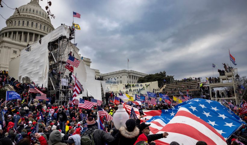 WASHINGTON, DC - JANUARY 6: Trump supporters clash with police and security forces as people try to storm the US Capitol on January 6, 2021 in Washington, DC. Demonstrators breeched security and entered the Capitol as Congress debated the 2020 presidential election Electoral Vote Certification. (photo by Brent Stirton/Getty Images)