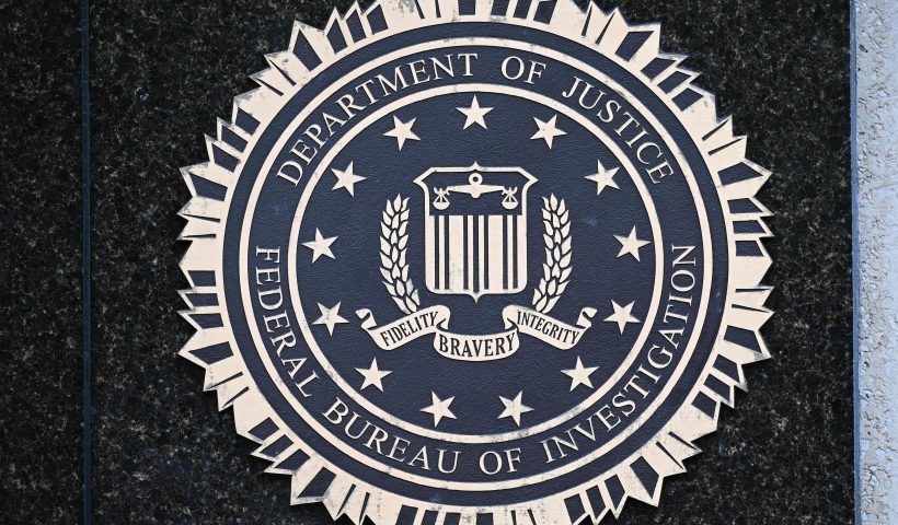 The seal of the Federal Bureau of Investigation is seen outside of its headquarters in Washington, DC on August 15, 2022. - Threats against the FBI and law enforcement agencies have increased following the search and seizure of top secret documents from former US president Donald Trump's Mar-a-Lago estate where he resides. (Photo by MANDEL NGAN / AFP) (Photo by MANDEL NGAN/AFP via Getty Images)