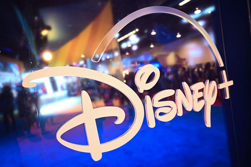 US-Entertainment-film-Disney-D23
Fans are reflected in Disney+ logo during the Walt Disney D23 Expo in Anaheim, California on September 9, 2022. (Photo by Patrick T. FALLON / AFP) (Photo by PATRICK T. FALLON/AFP via Getty Images)
