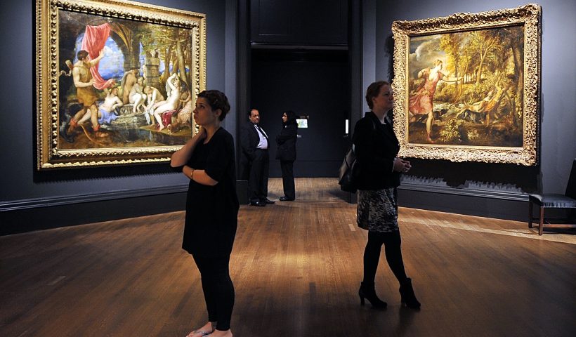LONDON, ENGLAND - JULY 09: People admire Titian masterpieces in the 'Metamorphosis: Titian 2012' Exhibition at the National Gallery on July 9, 2012 in London, England. The 'Metamorphosis: Titian 2012' Exhibition, which includes work by contemporary artists inspired by the Titian masterpieces, will run from July 11, 2012 until September 23, 2012. (Photo by Bethany Clarke/Getty Images)
