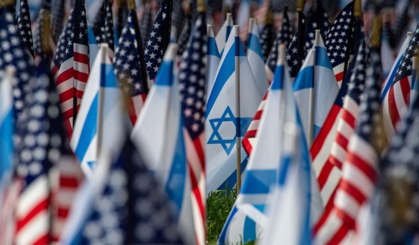 TOPSHOT - US and Israeli flags fill the field at Statler Park in Boston, Massachusetts, on October 18, 2023. President Joe Biden delivered unequivocal US backing for Israel in person on Wednesday, supporting his ally's stance that Palestinian militants were behind a deadly rocket strike on a Gaza hospital that has inflamed anger across the Middle East and beyond. (Photo by Joseph Prezioso / AFP) (Photo by JOSEPH PREZIOSO/AFP via Getty Images)