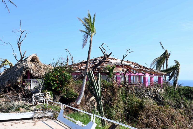 TOPSHOT - Picture of the damages caused by Hurricane Otis to the so-called Tarzan House --former residence of US actor Johny Weissmuller, famous for representing 'Tarzan' in numerous films-- located at the Los Flamingos hotel, in Acapulco, state of Guerrero, Mexico, taken on October 31, 2023. Otis smashed into the port city early on October 25 with winds of 165 miles (270 kilometres) per hour, leaving a trail of destruction. The storm severely damaged or destroyed many buildings and led to power and communication outages. Supermarket shelves were quickly stripped bare in a wave of looting. (Photo by FRANCISCO ROBLES / AFP) (Photo by FRANCISCO ROBLES/AFP via Getty Images)