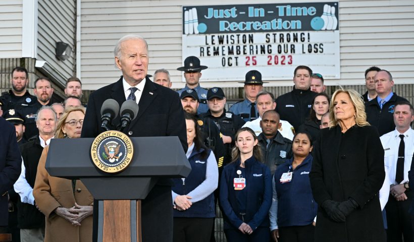 US President Joe Biden speaks surrounded by first responders, nurses, and others on the front lines of the response to the October 25, 2023 mass shooting in Lewinston, Maine, on November 3, 2023. The suspect in a mass shooting that killed 18 people in the US state of Maine was found dead on October 27, 2023, after a two-day manhunt that mobilized hundreds of law enforcement agents. (Photo by Mandel NGAN / AFP) (Photo by MANDEL NGAN/AFP via Getty Images)