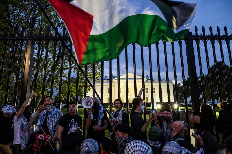 WASHINGTON, DC - NOVEMBER 4: Demonstrators gather outside the White House during the National March on Washington for Palestine while calling for a ceasefire between Israel and Hamas on November 4, 2023 in Washington, DC. Israeli Prime Minister Benjamin Netanyahu has stated that there will be no ceasefire or pause in hostilities in the Gaza Strip until all of the hostages held by Hamas are released. (Photo by Drew Angerer/Getty Images)