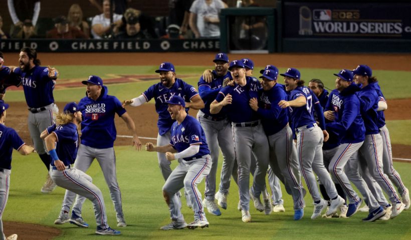PHOENIX, ARIZONA - NOVEMBER 01: The Texas Rangers celebrate after beating the Arizona Diamondbacks 5-0 in Game Five to win the World Series at Chase Field on November 01, 2023 in Phoenix, Arizona. (Photo by Sean M. Haffey/Getty Images)