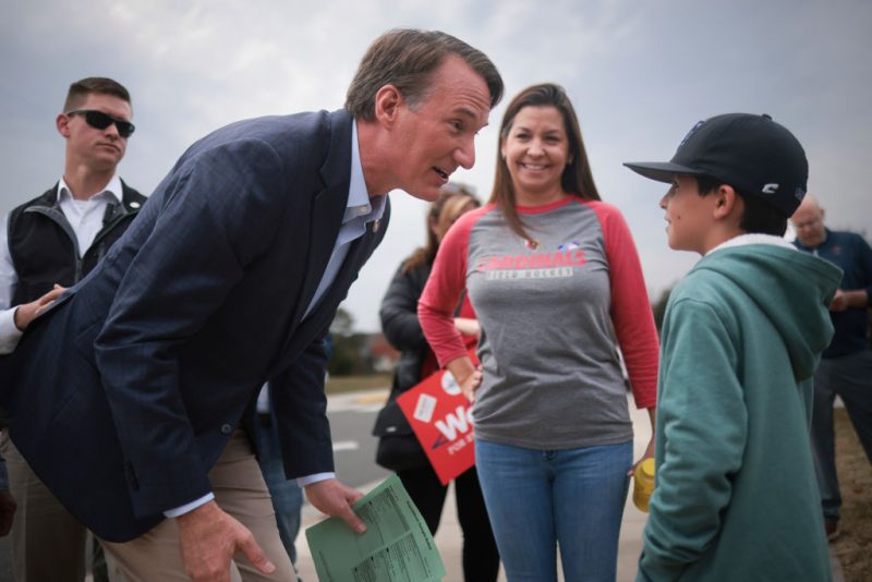 BRISTOW, VIRGINIA - NOVEMBER 07: Virginia Governor Glenn Youngkin greets voters and their children while campaigning at Piney Branch Elementary School November 7, 2023 in Bristow, Virginia. With control of Virginia’s General Assembly at stake, results of the day’s voting could potentially impact the commonwealth’s abortion policies as well as the national political future of Youngkin. (Photo by Win McNamee/Getty Images)