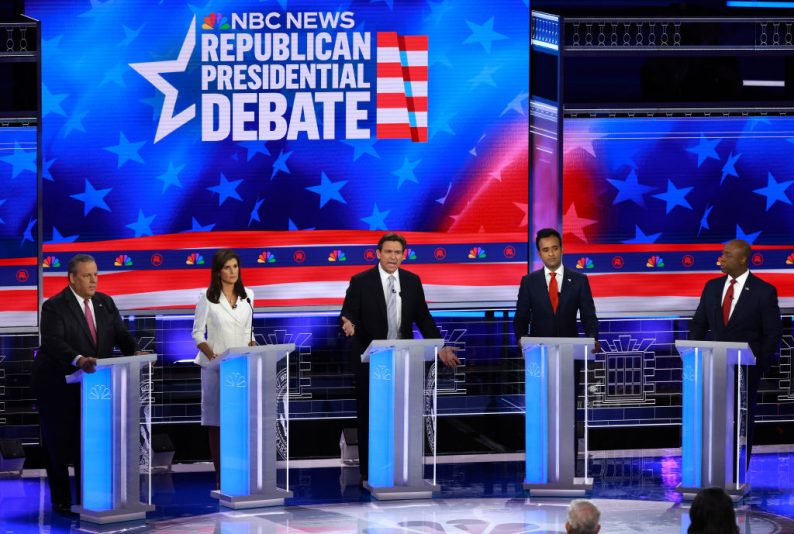 MIAMI, FLORIDA - NOVEMBER 08: Republican presidential candidates (L-R) former New Jersey Gov. Chris Christie, former U.N. Ambassador Nikki Haley, Florida Gov. Ron DeSantis, Vivek Ramaswamy and U.S. Sen. Tim Scott (R-SC) participate in the NBC News Republican Presidential Primary Debate at the Adrienne Arsht Center for the Performing Arts of Miami-Dade County on November 8, 2023 in Miami, Florida. Five presidential hopefuls squared off in the third Republican primary debate as former U.S. President Donald Trump, currently facing indictments in four locations, declined again to participate. (Photo by Joe Raedle/Getty Images)