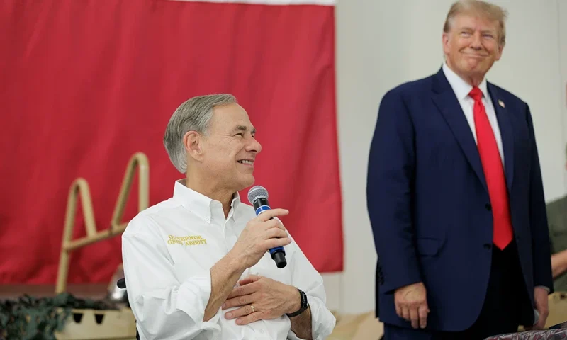Former President Trump Visits The Southern Border With Texas Governor Abbott EDINBURG, TEXAS - NOVEMBER 19: Texas Governor Greg Abbott gives remarks with Former President Donald Trump at the South Texas International airport on November 19, 2023 in Edinburg, Texas. Trump and Abbott served meals to Texas National Guard and Texas DPS Troopers that are stationed at the U.S.-Mexico border over the Thanksgiving holiday. (Photo by Michael Gonzalez/Getty Images)