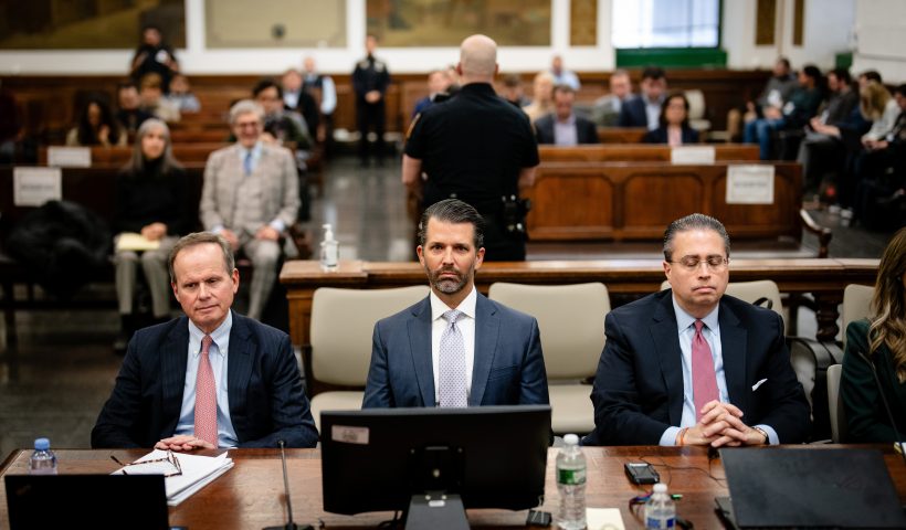 NEW YORK, NEW YORK - NOVEMBER 13: Attorney Christopher Kise, Donald Trump Jr., and Attorney Cliff Robert sit in the courtroom for Trump's civil fraud trial at New York State Supreme Court on November 13, 2023 in New York City. Trump Jr. is the first witness called by the Trump defense team during the civil fraud trial concerning allegations that he, his brother Eric, and former President Donald Trump conspired to inflate Trump Sr.'s net worth on financial statements provided to banks and insurers to secure loans. New York Attorney General Letitia James has sued seeking $250 million in damages. (Photo by Erin Schaff-Pool/Getty Images)