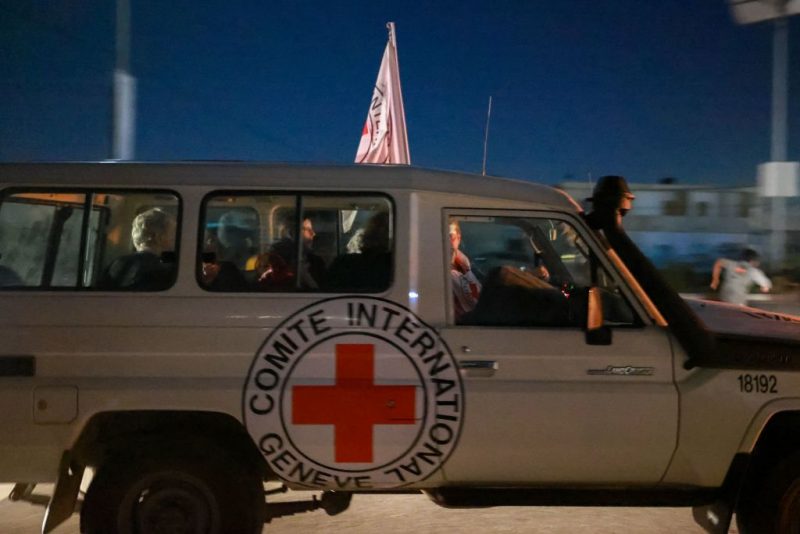 An International Red Cross vehicle reportedly carrying hostages released by Hamas crosses the Rafah border point in the Gaza Strip towards Egypt from where they would be flown to Israel to be reunited with their families, on November 24, 2023. After 48 days of gunfire and bombardment that claimed thousands of lives, a four-day truce in the Israel-Hamas war began on November 24 with 50 hostages set to be released in exchange for 150 Palestinian prisoners. (Photo by MOHAMMED ABED / AFP) (Photo by MOHAMMED ABED/AFP via Getty Images)