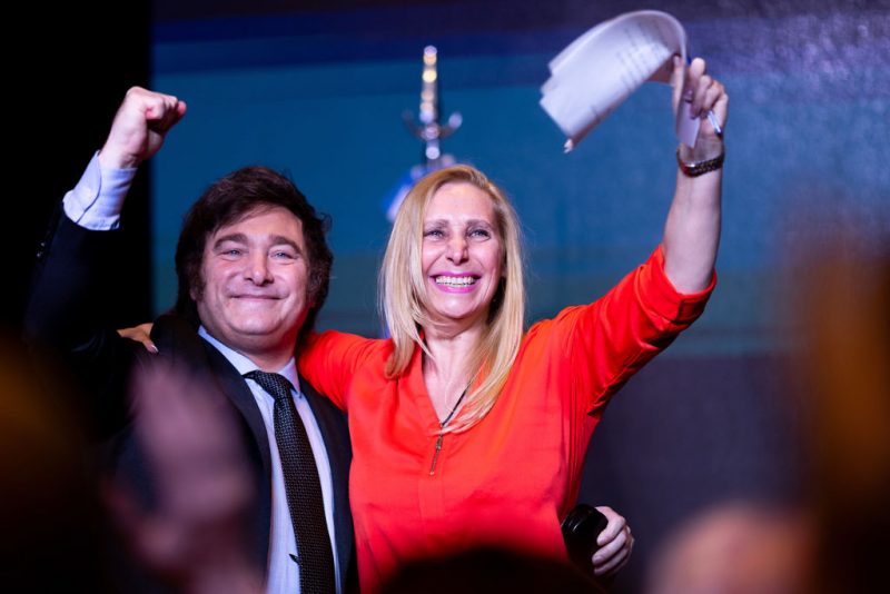 BUENOS AIRES, ARGENTINA - NOVEMBER 19: Newly elected President of Argentina Javier Milei of La Libertad Avanza celebrates with his sister Karina Milei after the polls closed in the presidential runoff on November 19, 2023 in Buenos Aires, Argentina. According to official results, Javier Milei of La Libertad Avanza reached 55,69% of the votes and Sergio Massa of Union Por La Patria 44,30%, with 99,25 of the votes counted. The presidential election runoff to succeed Alberto Fernandez comes as Argentinians have been hard hit by an annual 142,7% inflation. (Photo by Tomas Cuesta/Getty Images)