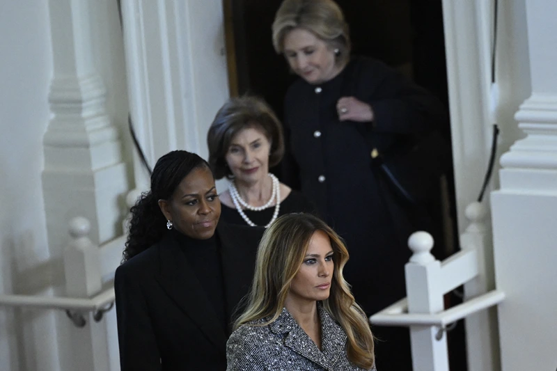 TOPSHOT - Former US Secretary of State Hillary Clinton, former US First Lady Laura Bush, former US First Lady Michelle Obama, and former US First Lady Melania Trump arrive for a tribute service for former US First Lady Rosalynn Carter, at Glenn Memorial Church in Atlanta, Georgia, on November 28, 2023. Carter died on November 19, aged 96, just two days after joining her husband in hospice care at their house in Plains. (Photo by ANDREW CABALLERO-REYNOLDS / AFP) (Photo by ANDREW CABALLERO-REYNOLDS/AFP via Getty Images)