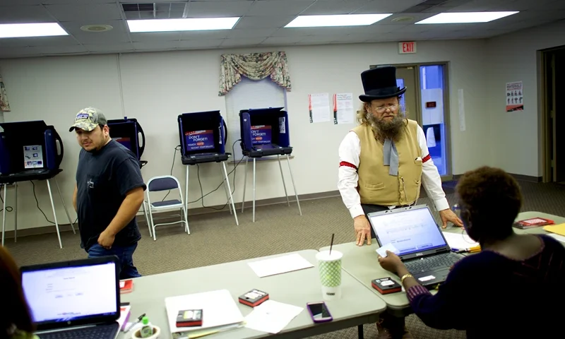 NORTH AUGUSTA, SC - FEBRUARY 20: Wade Fulmer, 59, dressed in costume as a Civil War undertaker, registers to vote at the Belvedere First Baptist Church polling precinct after participating in the 151st Civil War reenactment of the Battle of Aiken. A reeanctor since 1969, Fulmer was undecided only 30 minutes before voting. North Augusta, SC on February 20, 2016. Statewide voters will cast ballots today in the South Carolina Republican Presidential Primary, the "first in the south." (Photo by Mark Makela/Getty Images)