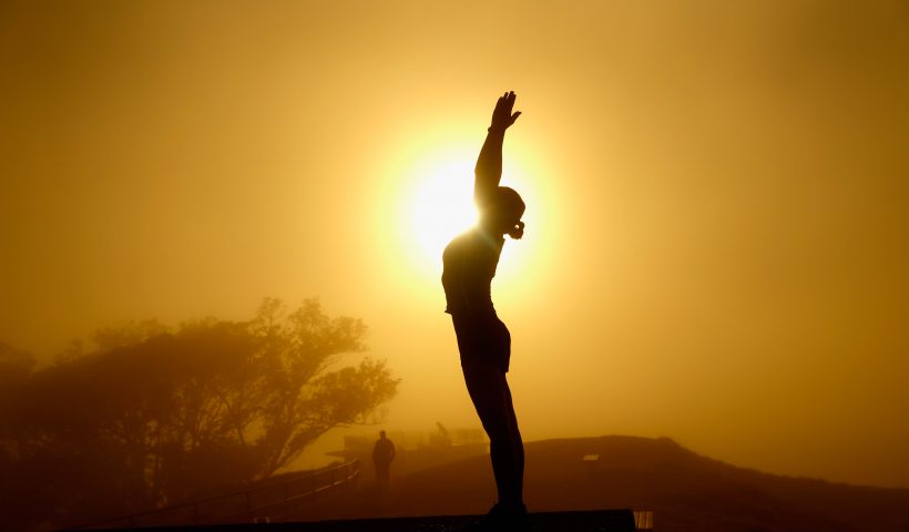 AUCKLAND, NEW ZEALAND - MAY 04: A lady practices yoga on the summit of Mt Eden as the sun struggles to shine through a blanket of fog over Auckland City on May 4, 2016 in Auckland, New Zealand. The morning fog disrupted flights and ferry services in the city. (Photo by Phil Walter/Getty Images)