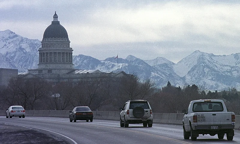 384972 02: Cars pass The Utah State Capitol January 24, 2001 in downtown Salt Lake City, UT. Hoping to polish Utah's image for the 2002 Winter Olympic Games, state lawmakers are trying again to crack down on polygamy. The Utah Senate endorsed a bill recently that sets aside $250,000 for prosecution of abuse and fraud in polygamous societies and $250,000 more for a polygamy hot line and emergency shelter for women and children. An estimated 25,000 people live in polygamous families in Utah, many tracing their beliefs to fundamental Mormonism even though The Church of Jesus Christ of Latter-day Saints has disavowed the practice. Utah was required to outlaw polygamy in its constitution as a condition of statehood. (Photo by Michael Smith/Newsmakers)